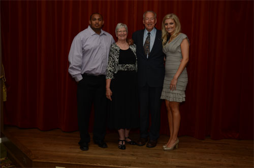 Photo of Bob, Dianne, and grandchildren