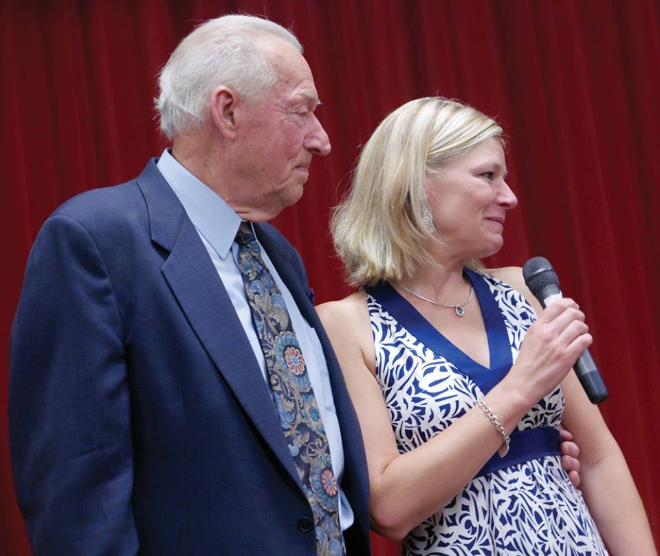 Photo of Bob with daughter Suzanna giving well wishes