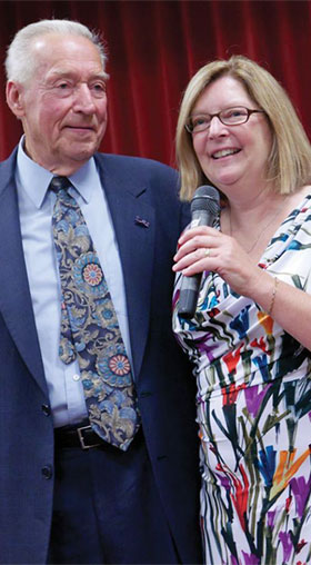 Photo of Bob with daughter Sarah giving well wishes