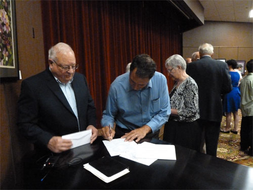 Photo of Dianne's brother Ed Nagelkirk signing as witness for bride